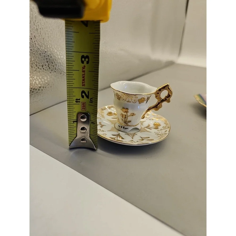 Vtg Souvenir Bone China Miniature Tea Cup &‎ Saucer, Gold on White Floral